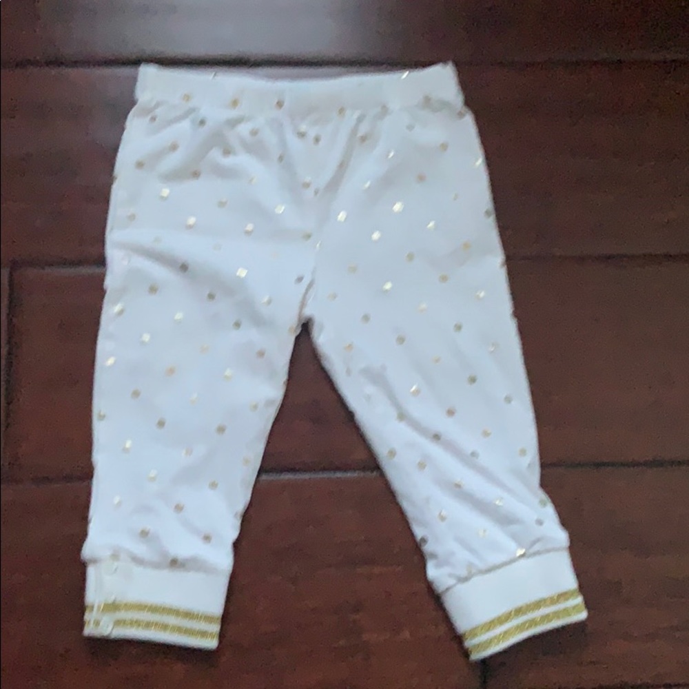 Whit me and gold pants
